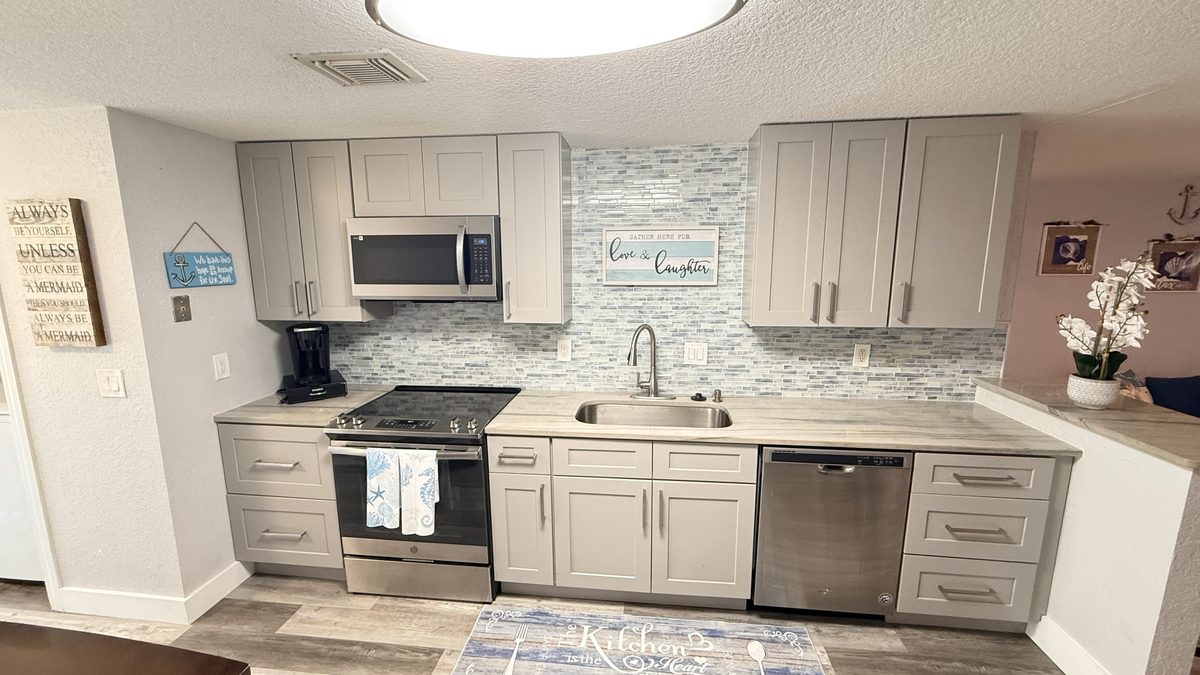 Remodeled kitchen with grey shaker cabinets in Bradenton